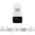 Detailweergave van de rollerstempel met dieren en decoratieve tape met strikpatronen - Strik