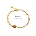 Dettaglio del bracciale dorato con pietra ambra e stelle, peso 3,1g, lunghezza 17+3cm - Bracciale in Pietra del Sole