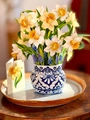 Macro shot of 3D pop-up card featuring a vase with daffodils and grape hyacinths - English Daffodils