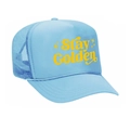Detailed close-up of light blue trucker hat with yellow Stay Golden print and mesh - All Sky Blue