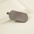 Detail view of a gunmetal grey stainless steel military dog tag pendant with a top ring - 49mm*28mm / Black