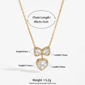 Collana d'oro in acciaio inossidabile con ciondoli a fiocco in zircone e cuore su bianco - Collana d'Oro(KD1568)