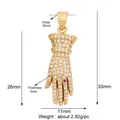 Hamsa Hand pendant in gold plating with cubic zirconia and red gem, size 33mm by 11mm - M599152-gold / Gold