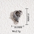 Detail view of a 17.5mm x 13.1mm silver lobster clasp with textured ribbed surface - Vintage Silver Ribbed Lobster Clasp
