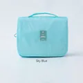 Sky blue portable travel toiletry bag with top handle and waterproof nylon fabric - Light Blue