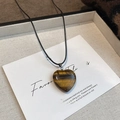 Detail of heart-shaped tiger eye stone pendant on black cord in a cream gift box - 36# Necklace - Black - Brown