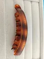 Detailed view of amber tortoise shell banana hair clip with curved resin teeth - Matte Tortoiseshell