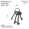 Vintage Nordic cast iron key set with 4 antique style keys on a rustic metal ring - 6175 Four Keys with Ring