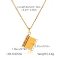 Detail of gold book pendant with For all those who found themselves in books engraving - Gold Lettering Book