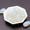 Translucent white opal egg stones in a modern polygon dish for Easter decoration - Opalite (Synthetic) (1pc)