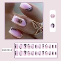 Detail of pink gradient press-on nails with black leaves and gold glitter patterns - BKS2353 Pink Gradient Black Leaves Gold Foil Glitter