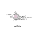 Macro shot showing dimensions of heart-shaped planet ear piercing with pink zirconia - Pink Planet Heart Style
