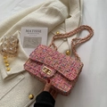 Pink tweed crossbody bag with golden clasp and chain strap in elegant style - Pink