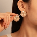 French vintage gold earrings with faux pearls and rhinestones worn by a female model - Style 21-Gold Cluster Geometric Pearl Studs (Silver Earring Post)