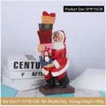 Santa Claus resin figurine holding gift boxes with Merry Christmas text on wooden base - Santa Embracing Gift Box