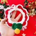 Detail view of a red and green knitted pet scarf with yellow crochet balls for Christmas - M / Single Bell Red Bib