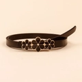 Slim black waist belt for women with three gold-trimmed floral metal buckles on beige - 100cm / Black