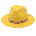 Close-up of yellow straw Panama hat featuring colorful beads and rope detailing - One Size / Yellow