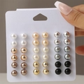 Close-up of 18 pairs of multi-colored pearl and metallic stud earrings on a display card - 18 Pairs Set - Multi Color Ball Pearl Mix