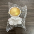 Astronaut night light in white plastic with golden helmet mask, battery powered - Small Astronaut Gold Book