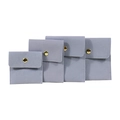 Light blue microfiber jewelry pouches with snap buttons in four sizes for rings and necklaces - Small / Blue Gray