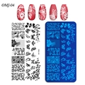 Macro view of nail art stamping plate with butterfly and rose patterns for DIY manicure - Butterfly Rose Style (OMJ-04)