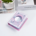 Pink 3-inch mini photo album with cute cat design on desk with plant and book - Pink Round Headphone