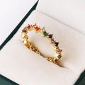 Macro shot of gold-plated ring with rainbow gradient zircon stones set in velvet box - Adjustable Open / Multi-color Zirconia (Gold)