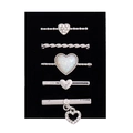 Close-up of 5-piece silver watch band charms with hearts and rhinestones on black card - D3040 Heart Set Silver Set 30