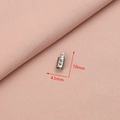 Detailansicht einer 10x4,5mm silbernen Edelstahl-Endkappe für DIY-Schmuckherstellung - Stil 2 (4.5x10mm) / Silber (4.5x10mm)