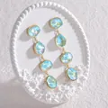 Long irregular light blue gemstone earrings with gold-plated chains in a four-tier design - Light Blue (E698)