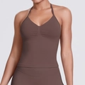 Detail of seamless halter yoga top with gathered chest and rib-knit chocolate fabric - Coffee