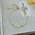 Adjustable golden tulip bracelet featuring an opal-style stone and zircon accents - White Tulip Cat Eye Bracelet Gold