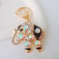 Detailed view of golden elephant keychain with sparkling colorful rhinestones and lobster clasp - Black