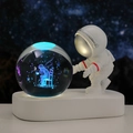 Astronaut night light featuring blue glowing crystal ball and thinking figure design - Sphere / Rose Figure (Multicolor Light)