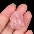 Hand-carved rose quartz frog statue with natural translucent pink gemstone texture - Rose Quartz