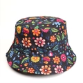 Detail shot of the floral bucket hat featuring vibrant orange and pink flower patterns - Black Background Colorful Floral Green Leaves (Style K)