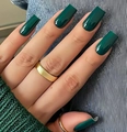 Macro view of glossy emerald green square press-on nails with a minimalist gold ring - Emerald Green (CW693)
