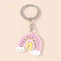 Colorful acrylic rainbow keychain with polka dots and smiling clouds in a cute design - Pink Smiling Cloud