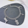Bohemian silver cowboy charm bracelet featuring vintage boot, hat and horseshoe charms - Silver Cowboy Bracelet (07 Silver 5352)