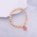 Elegant natural freshwater pearl bracelet with a pink heart pendant on white background - 13# Peach Pendant Bracelet - Pink