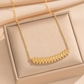 18K gold plated stainless steel necklace with sparkling crystal spiked pendant on silk - Gold Necklace