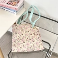 Detail of waffle-textured canvas tote with pink polka dots and cute dog patterns - Puppy Paradise