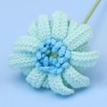 Detailed view of hand-crocheted light blue gerbera daisy with soft yarn texture details - Cute Four-colored Afghan African Daisy Branch - Blue