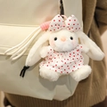 Cute plush bunny keychain with red polka dot dress hanging on a white backpack - Red Polka Dot Dress Style