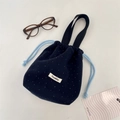 Navy blue wool drawstring bucket bag with white polka dots and handheld strap - Navy Blue
