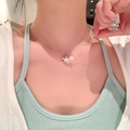 Elegant silver starfish and pearl pendant necklace on female model neck - X1475 Silver - Starfish Pearl