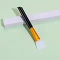 Silicone face mask brush with white fan head, gold ferrule, and glossy black handle - Black