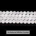 Polished 1A natural clear quartz round beads for DIY jewelry making on black background - 1a Natural White Crystal / 10mm approx 37pcs