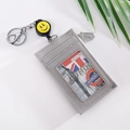 Grey cross-grain leather card holder with yellow smiley face retractable badge reel - Gray